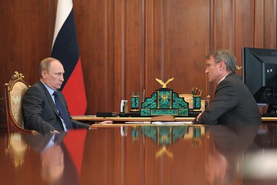 С президентом, председателем правления Сбербанка России Германом Грефом. 31 марта 2014 года